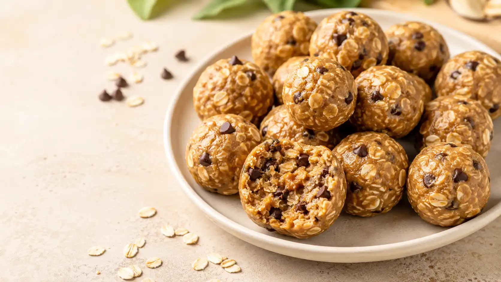 No-bake peanut butter oat balls with rolled oats and mini chocolate chips